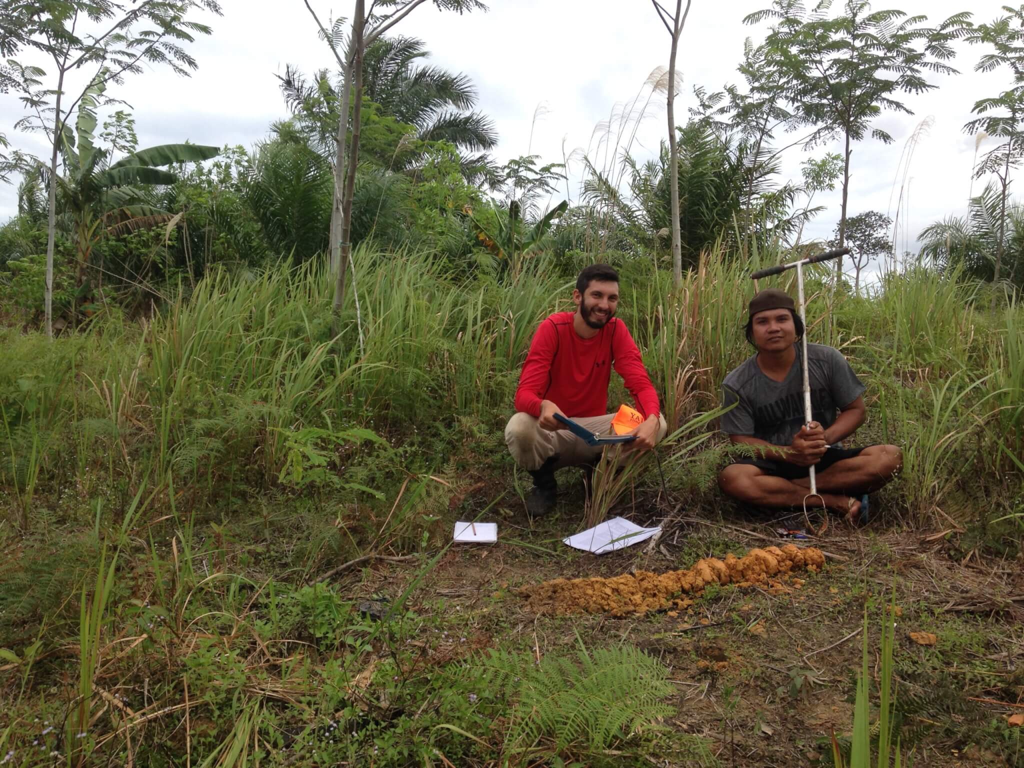 Simeon Max in the field; his background is in forestry and on-ground restoration.